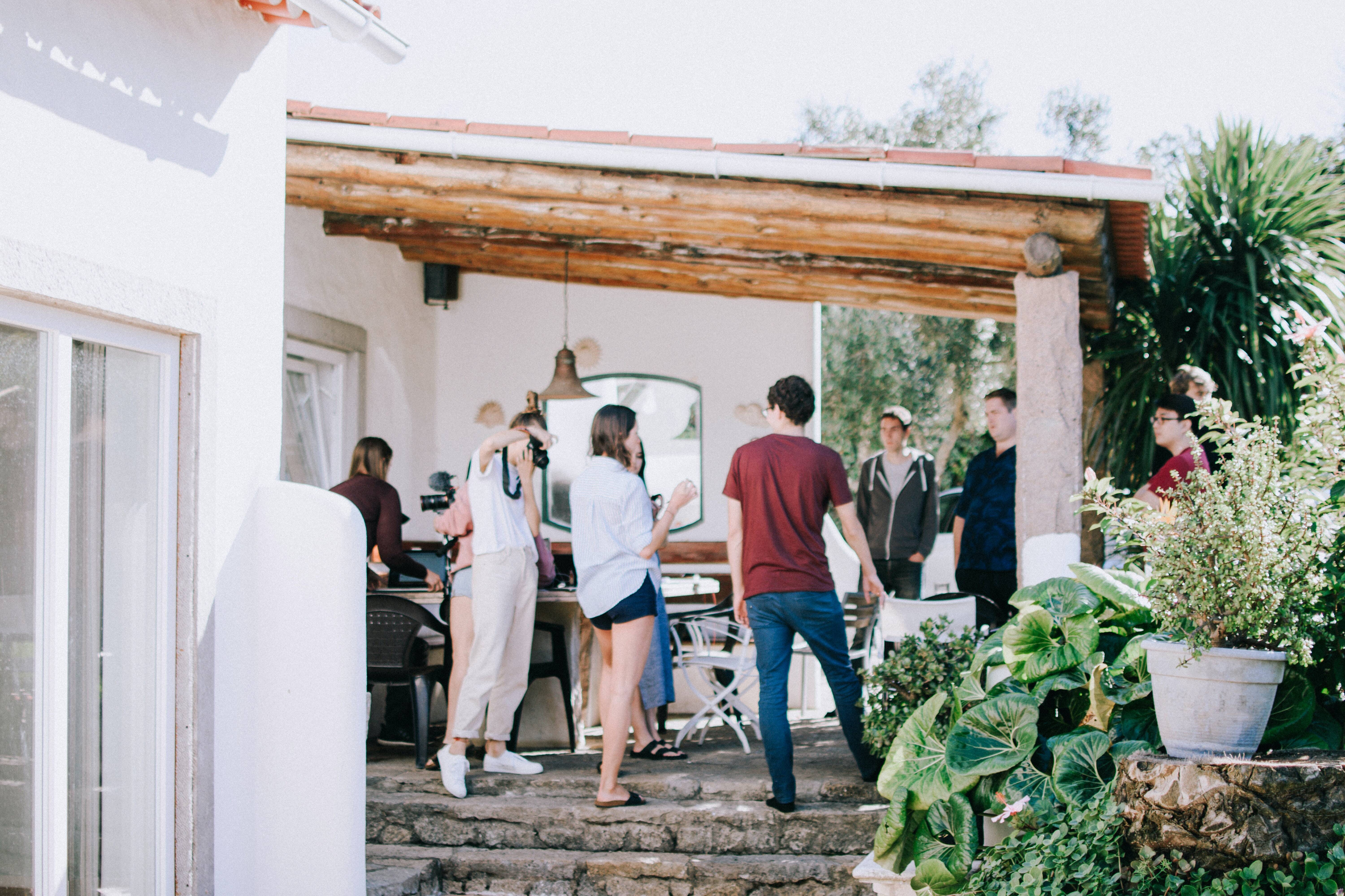 people standing on permeable paver patio